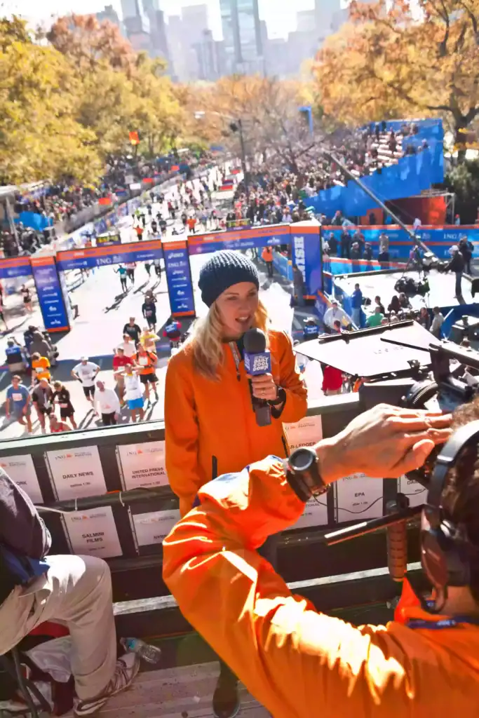 runner and former Olympian Carrie Tollefson announces near the finish line at the 2011 New York City Marathon
