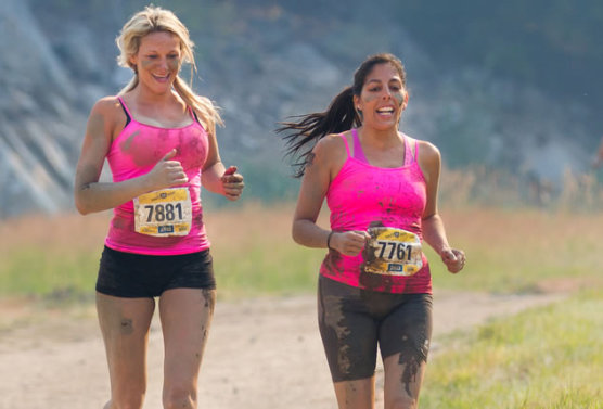 Two runners share the trail at Boise, Idaho's Dirty Dash. (© Tracy King | Dreamstime.com)