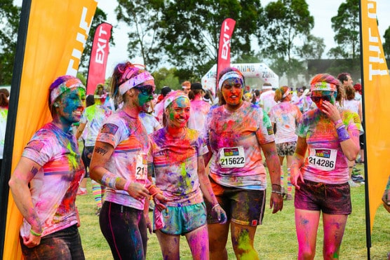 Runners gather at the finish line of the Color Run in Melbourne, Australia, in March 2014. The Color Run 5K will be part of the Hospice Half in 2015. (Photo by Chris Phutully/flickr) 