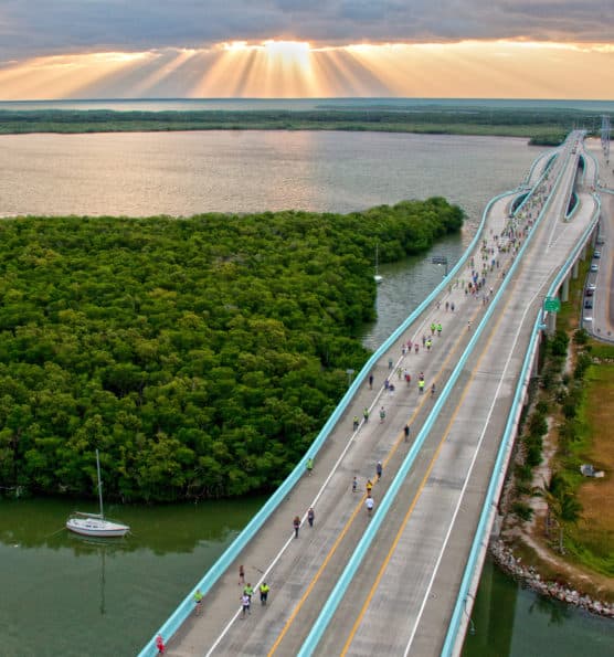 Entrants in the Key Largo Bridge Run reach the apex of the Jewfish Creek Bridge on the Florida Keys Overseas Highway Saturday, Nov. 10, 2012, in Key Largo, Fla. The event attracted 885 participants who competed in half-marathon, 5k and 10k divisions. FOR EDITORIAL USE ONLY (Andy Newman/Florid Keys News Bureau/HO)