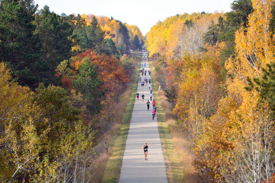 Runners make their way along the Paul Bunyan Trail at the Bemidji Blue Ox Half Marathon in Bemidji, Minn. (Photo courtesy Bemidji Blue Ox Marathon)