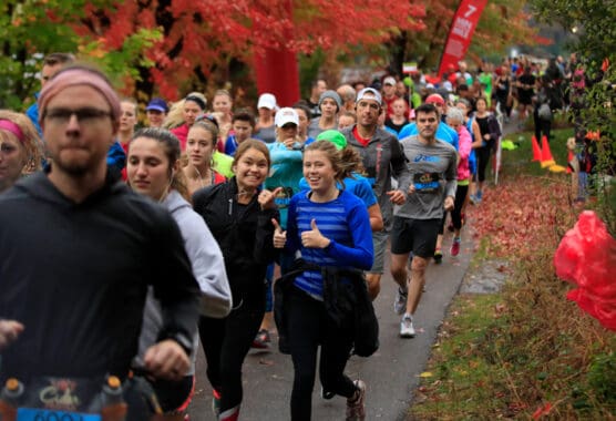 Runners on the course at the Hot Cider Hustle Half Marathon in Omaha, Nebraska.