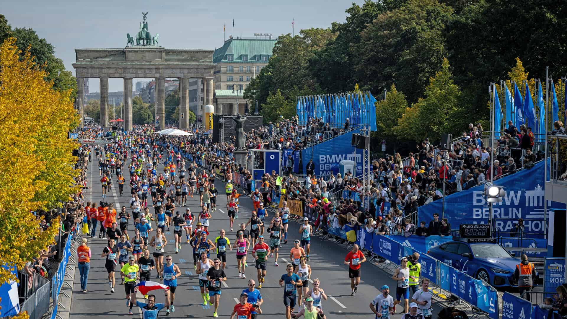 Runners along the course of the Berlin Marathon, one of our favorite and best marathons in Europe.