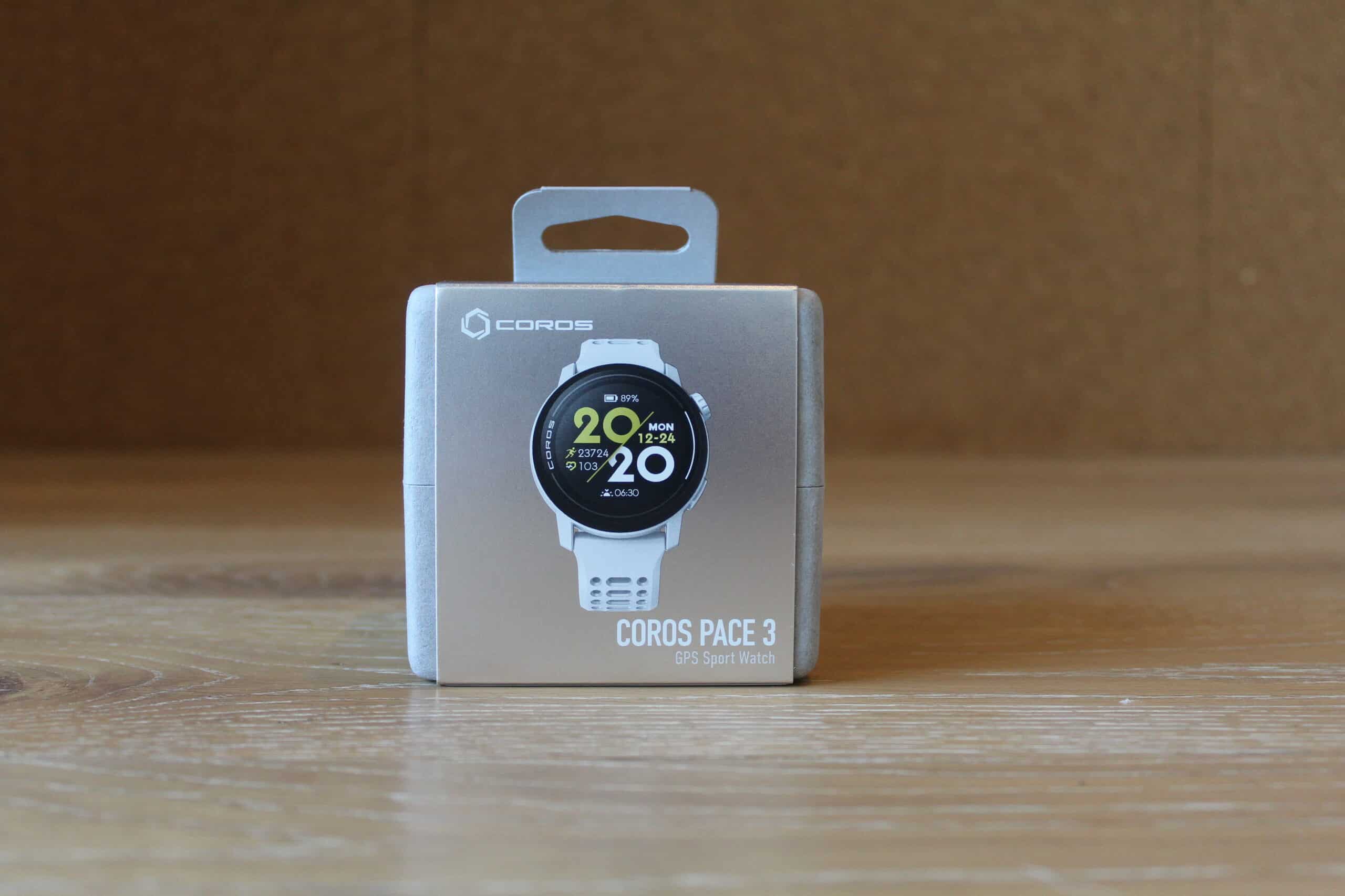 The COROS Pace 3 box against a wood floor.