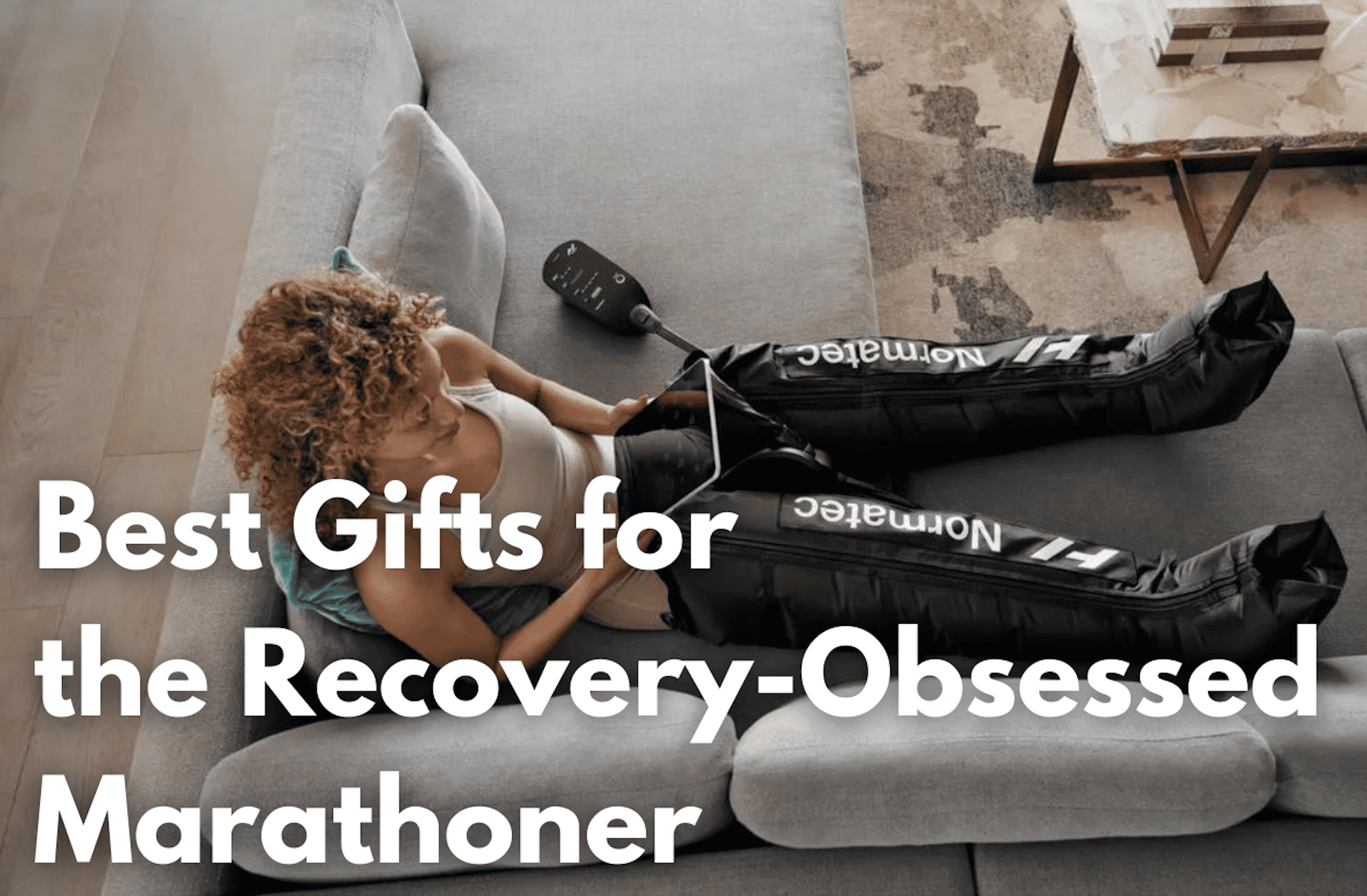 Normatec Hyperice with a woman sitting on a couch text overlay best gifts for recovery-obsessed marathoner.