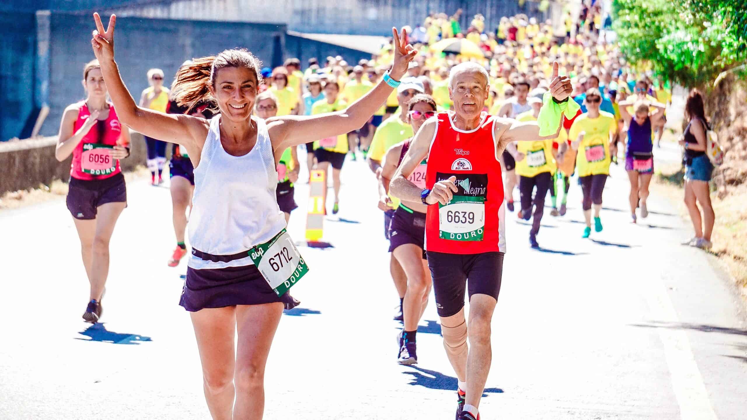 Running on a budget in marathons and half marathons with woman on the course.