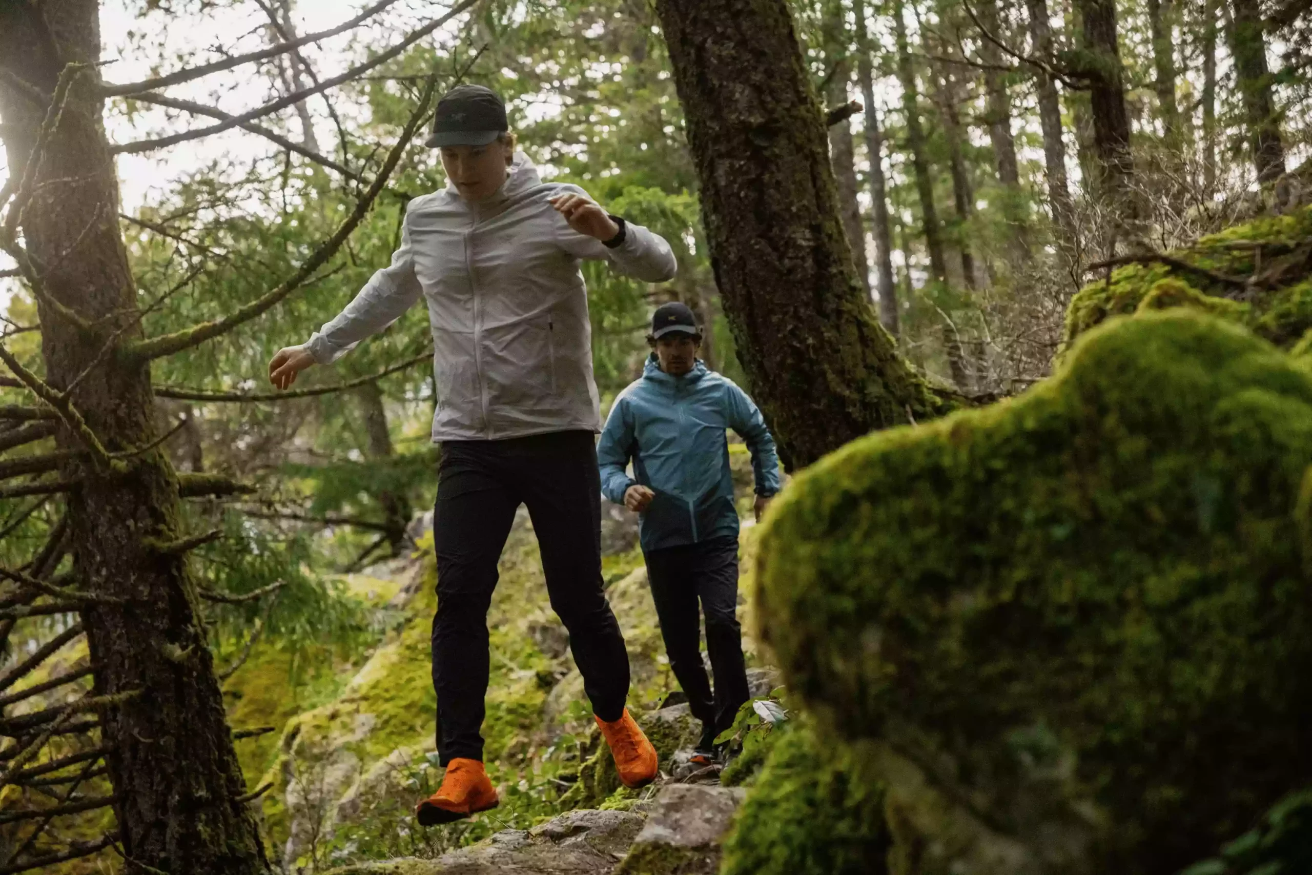 men running in the forest