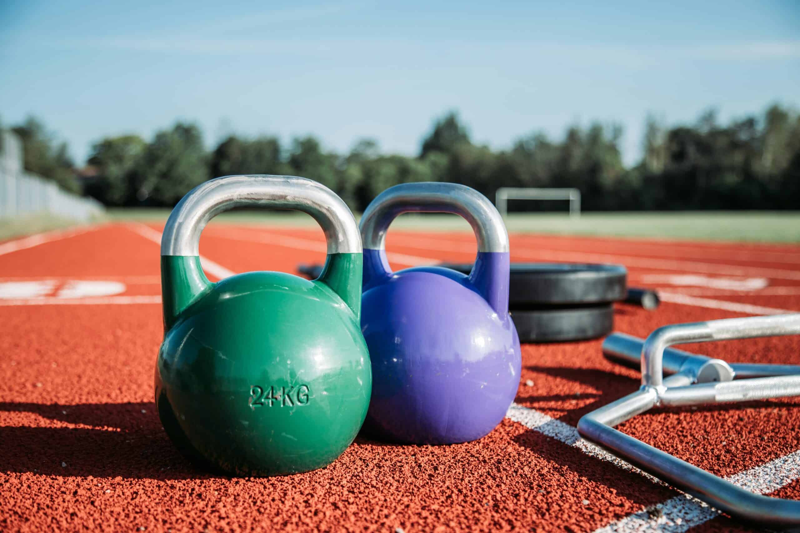 Kettlebell workout for runners at a track