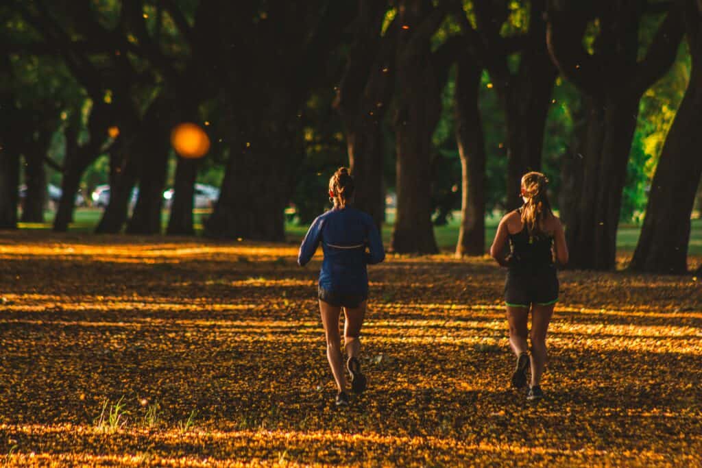 Two runners on an easy run, possibly during their half marathon taper