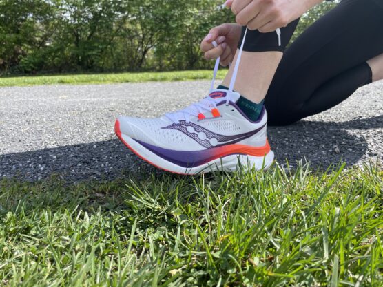 Our writer testing the Saucony Endorphin Speed 4 for review on a gravel run.