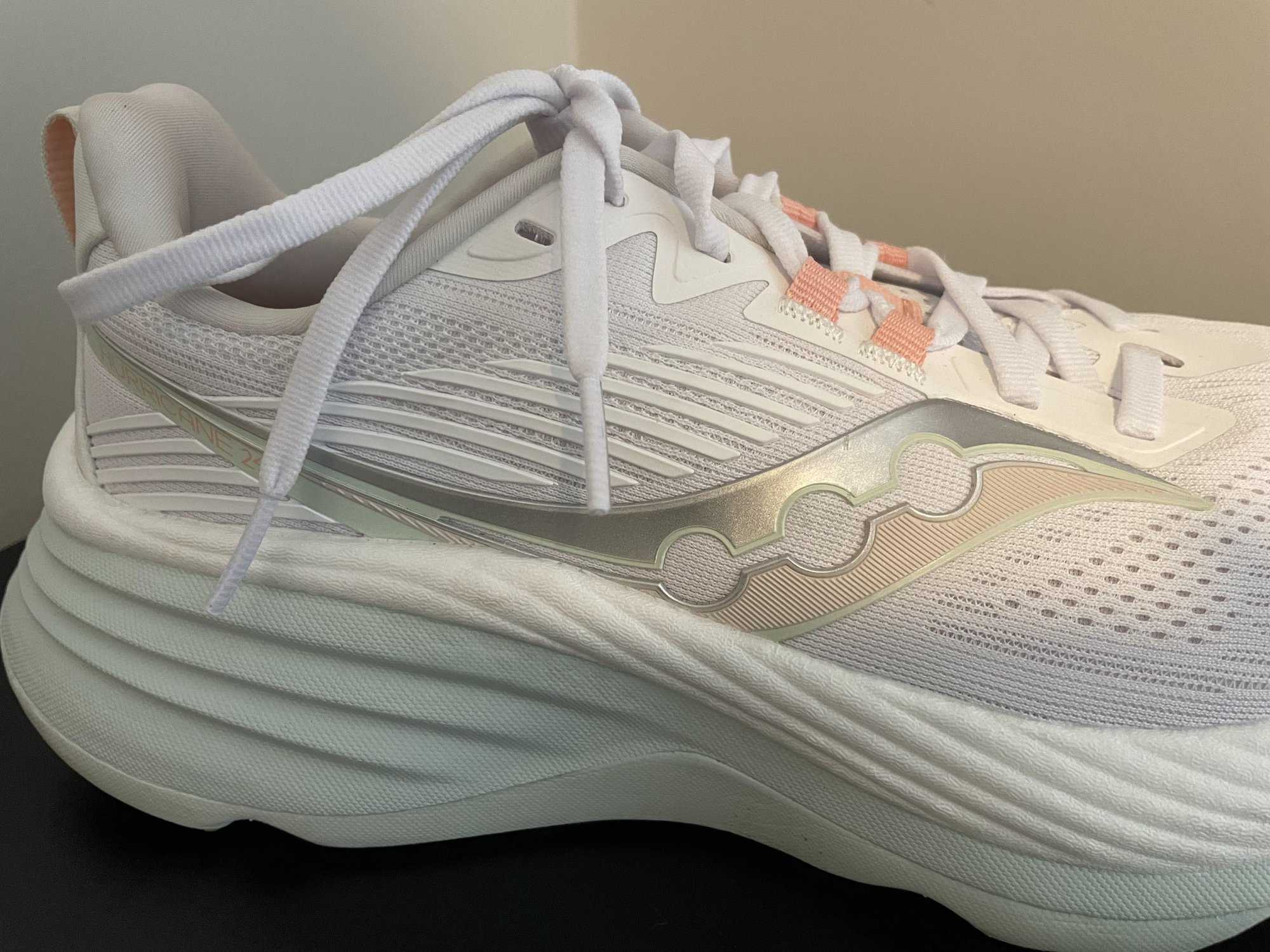 Side profile of the Saucony Hurricane 24, showing the thick and cushioned midsole of the running shoe.