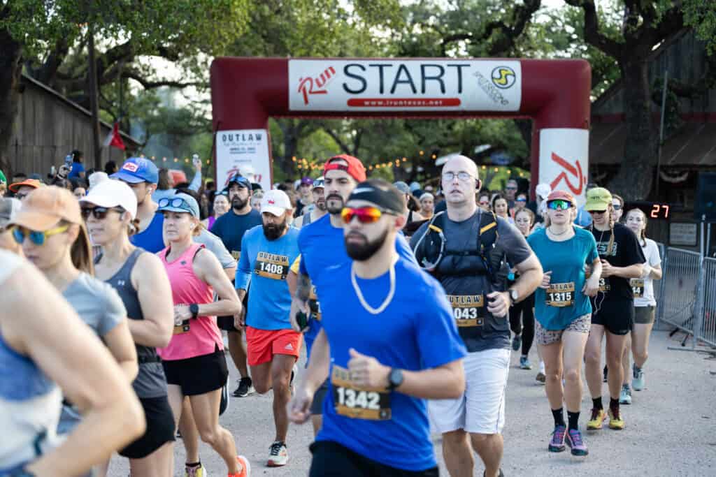 runners at the start of the Outlaw Half Marathon